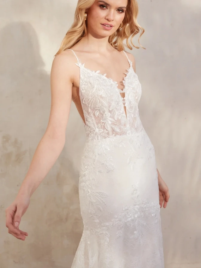 Model wearing a gown by Justin Alexander