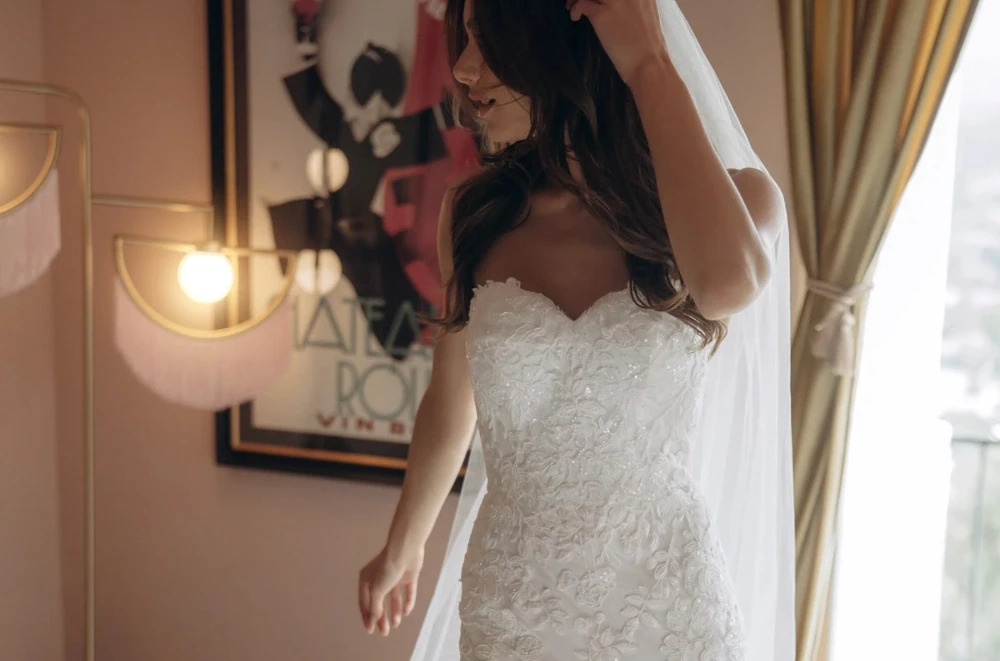 Model wearing a gown by Stella York