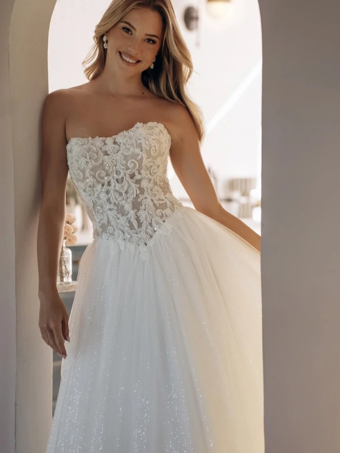 Model wearing a gown by Stella York