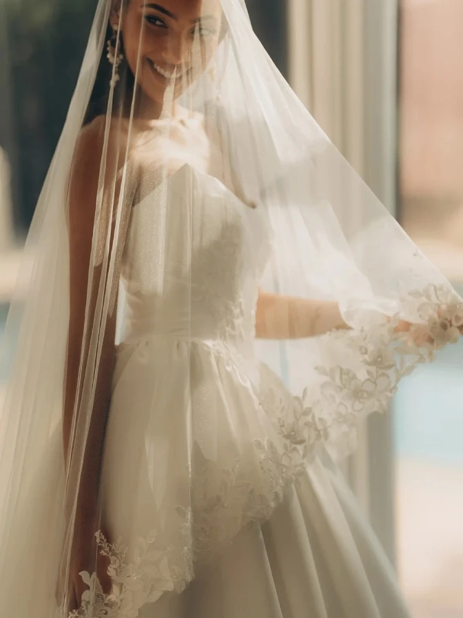 Model wearing a gown by Stella York