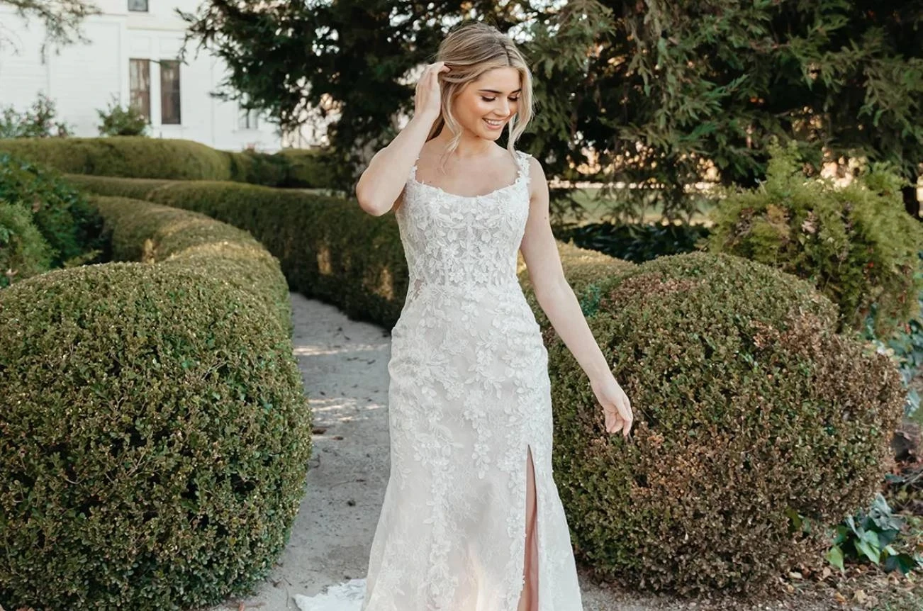 Model wearing a gown by Stella York