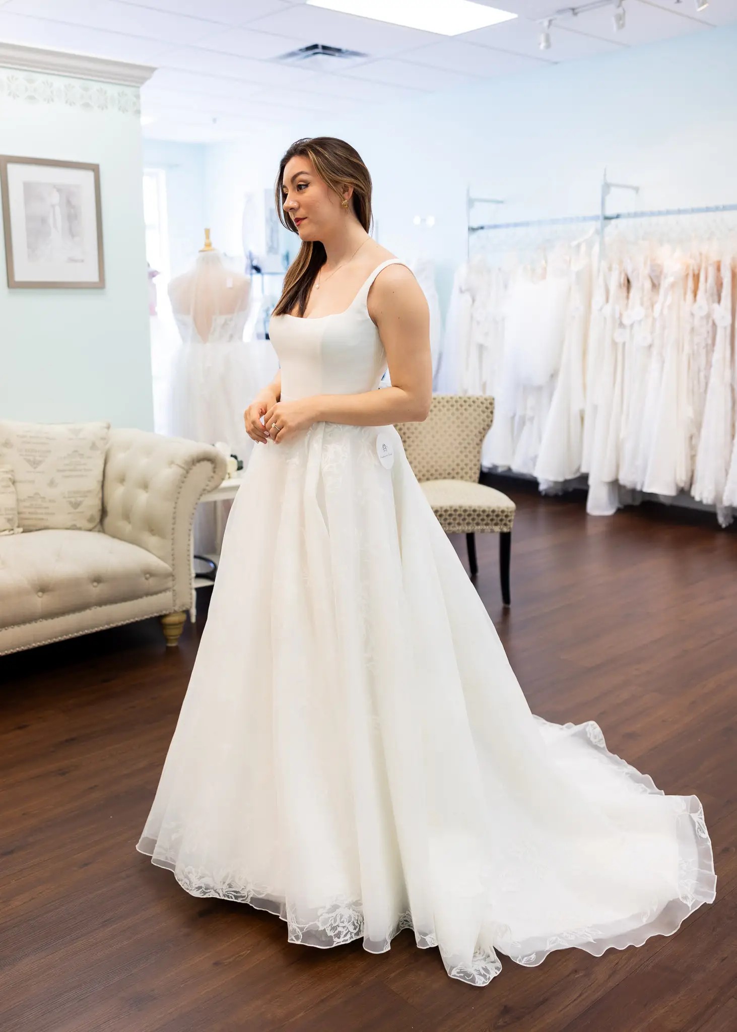 Model wearing a white bridal gown